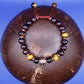 Garnet and Tiger's Eye Bracelet with a Lion's Head Charm